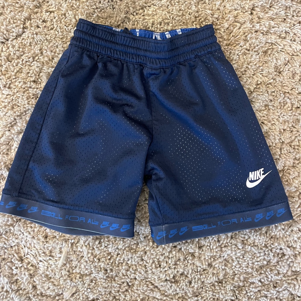 Boys Nike reversible shorts in size small.